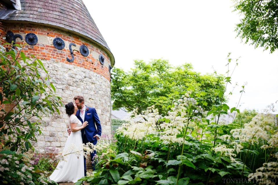 Wedding photography in the gardens at Bury Court Barn