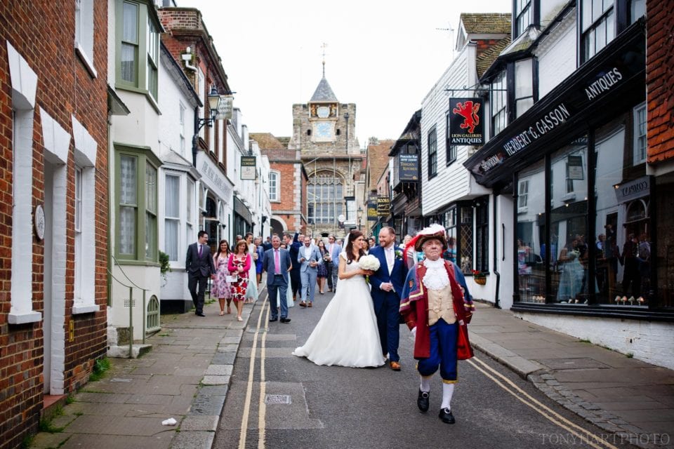 Town Crier Rex Swain leading Rachel & David from Rye Town Hall to The George. 