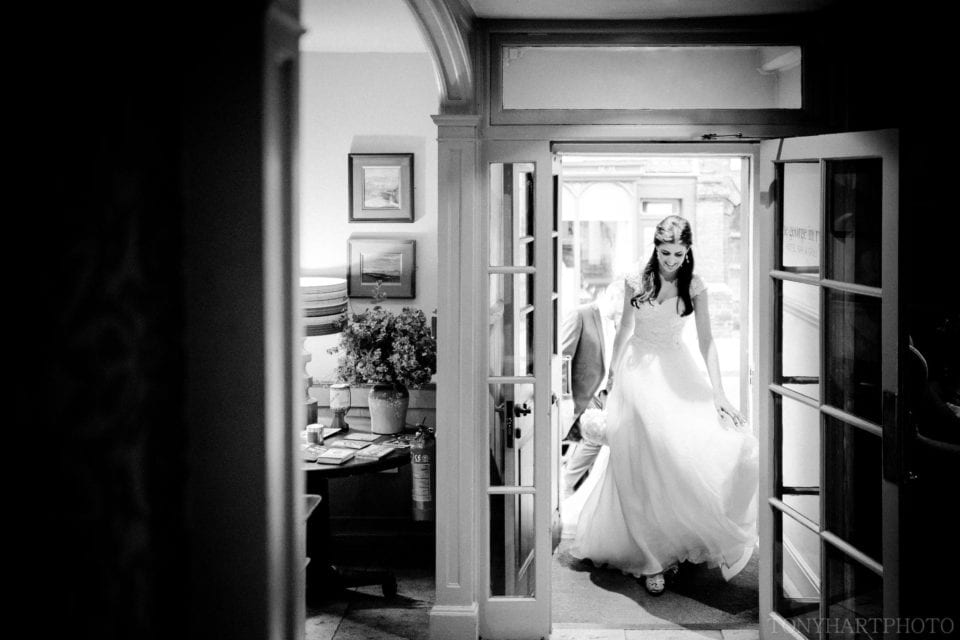 Rachel arriving for her wedding reception at The George in Rye
