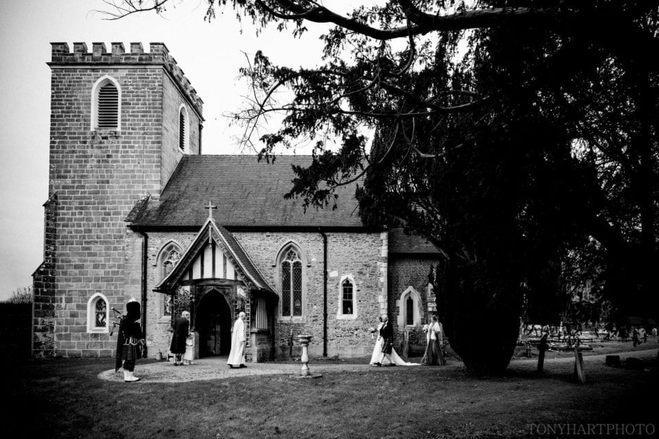 Nicole arriving at the church black and white