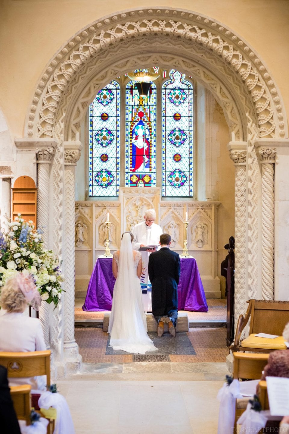 Kneeling at the altar