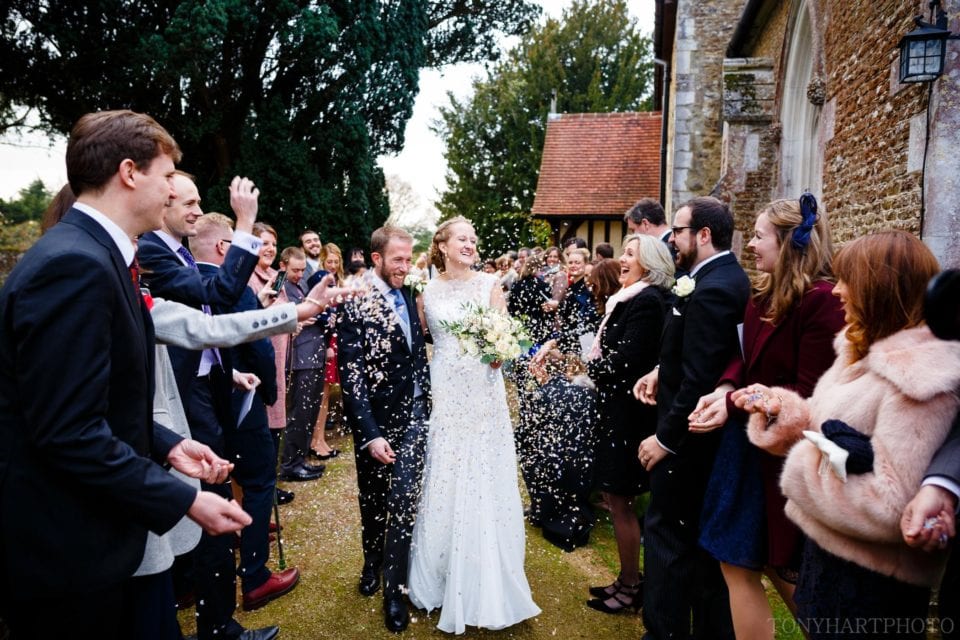 Confetti wedding photos at Peper Harow church