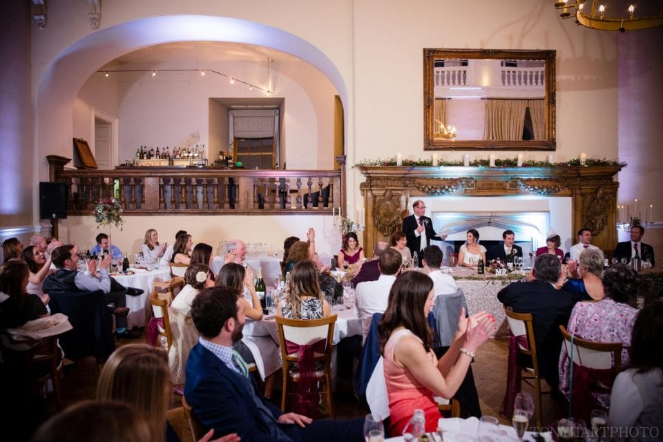 Wide shot of the Great Hall during the wedding speeches