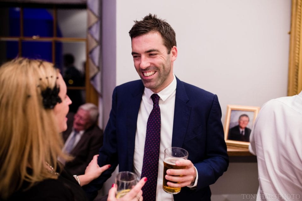 Guests chatting by the Gallery Bar
