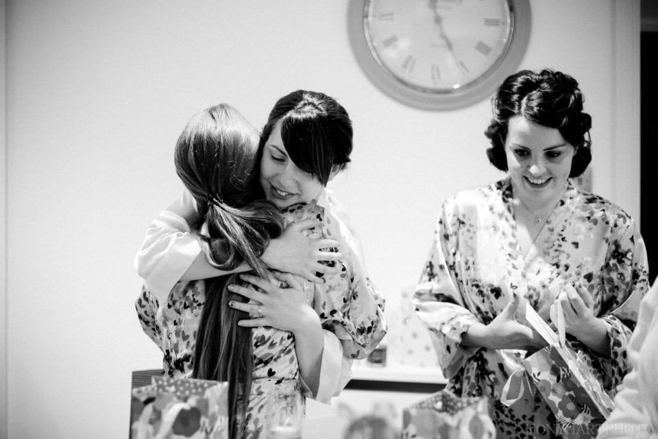 Bridesmaids greet each other