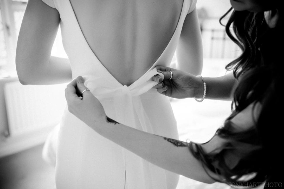 Doing up the back of the dress