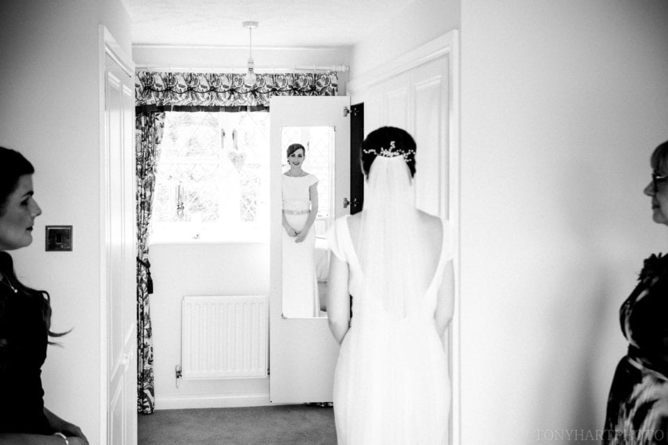 Emma takes a look in the mirror