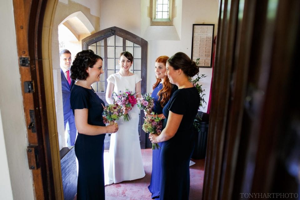 Bride and bridesmaids arrive at church