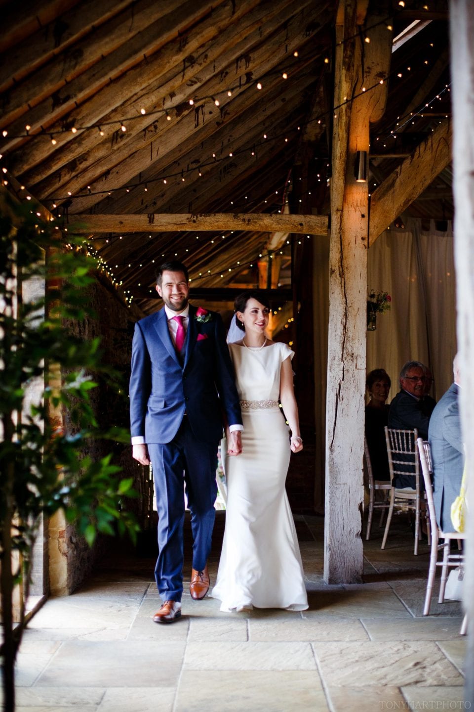 Phil and Emma enter their wedding breakfast