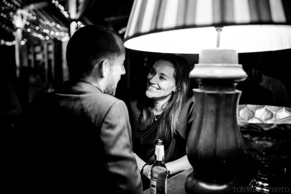 Wedding guests chatting in the evening