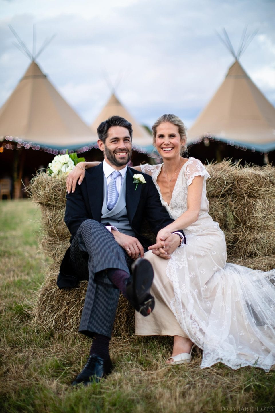 Grace & Jumbo pictured outside their tipi wedding in West Sussex