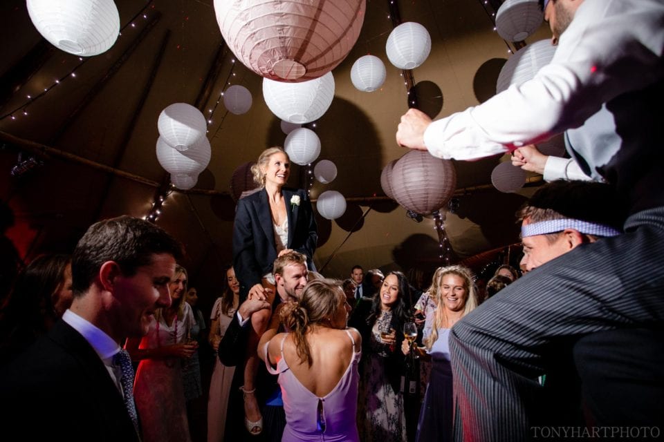 Bride & Groom on shoulders on the dancefloor