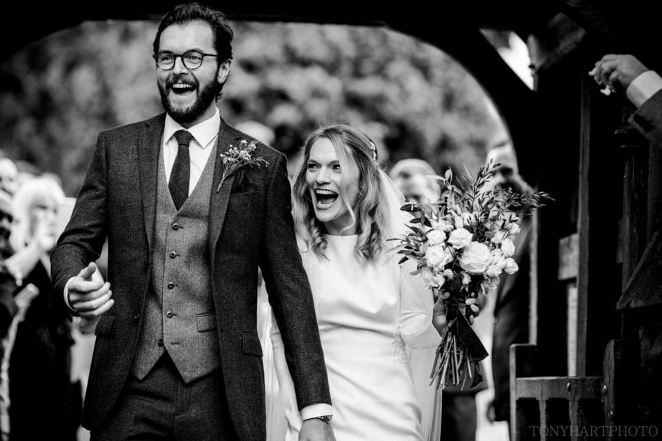 Anna & Al greeted by their guests following the wedding ceremony