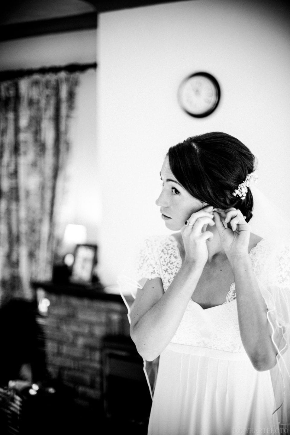 Liz putting on her earrings