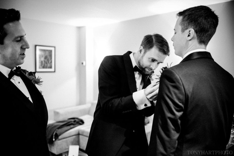 Northbrook Park Wedding Photography - Groom James sorts out his best man's buttonhole