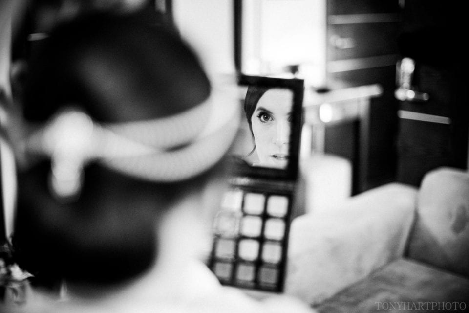 Checking her eye makeup