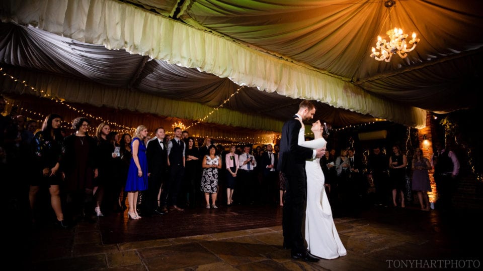 Northbrook Park Wedding Photography - Bride & Groom share their first dance in the Orangery