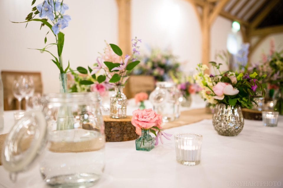 Gorgeous wedding breakfast setup at Rivervale Barn. Flowers by Hannah Berry