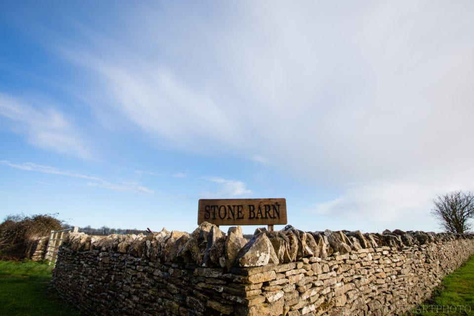 Stone Barn wedding venue sign