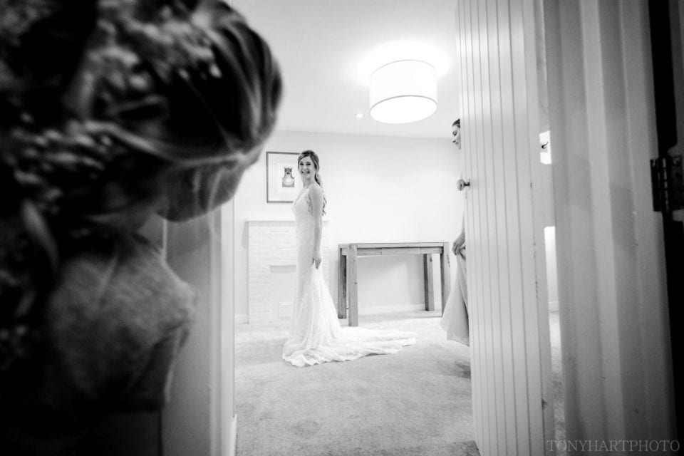 Lauren getting into her dress in the Gatehouse